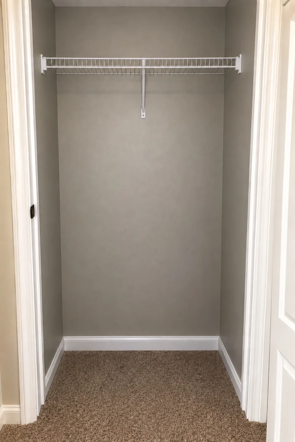Before: original shallow closet before opening the wall
